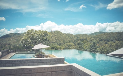 Resort infinity pool overlooking hills